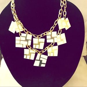 Beautiful statement necklace with geometric charms
